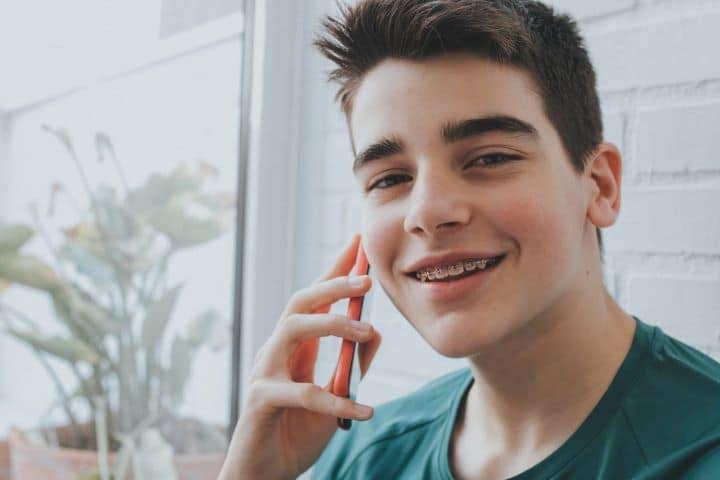 teenager with braces