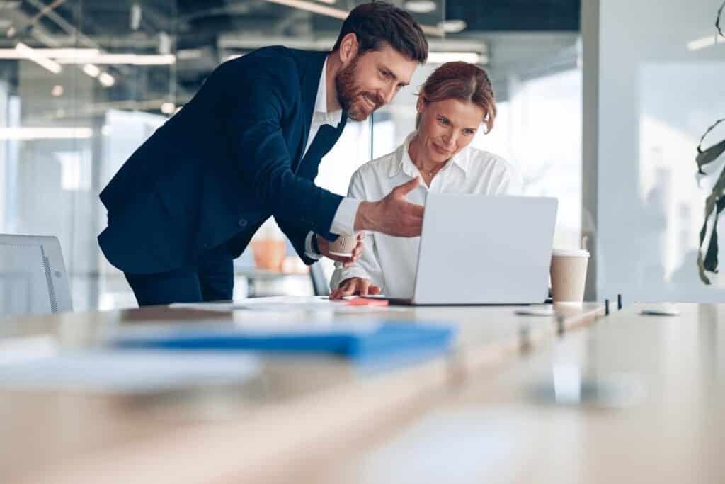 two colleagues talking in the office