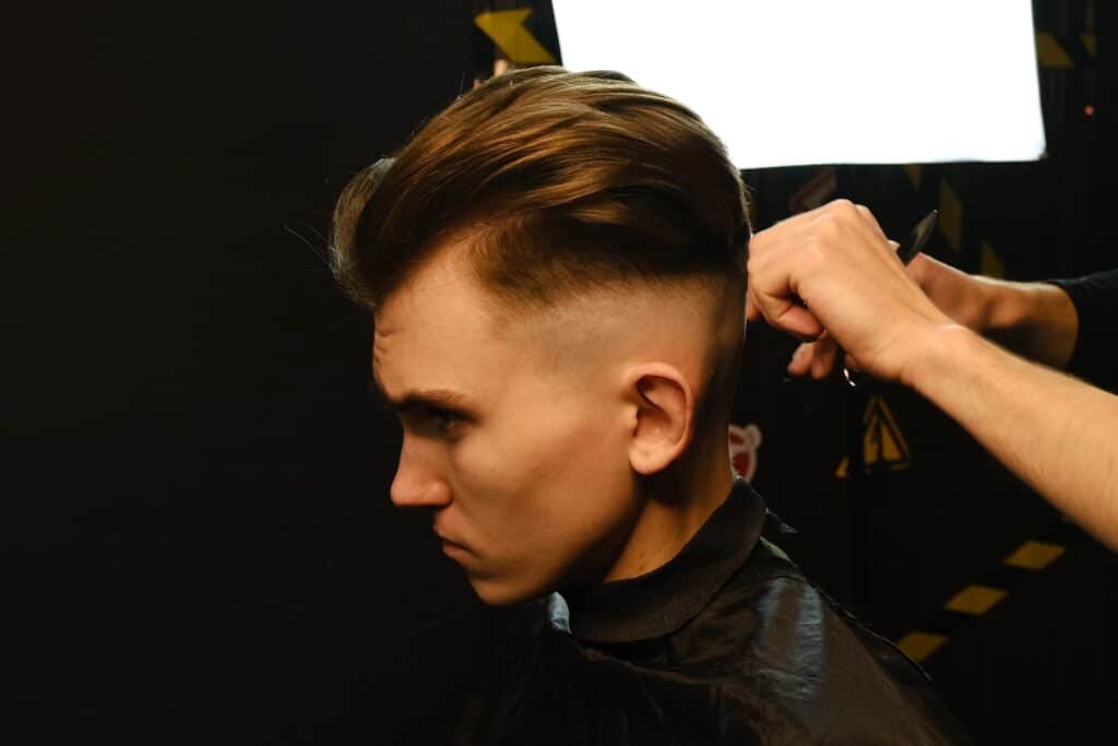 man getting hair cut